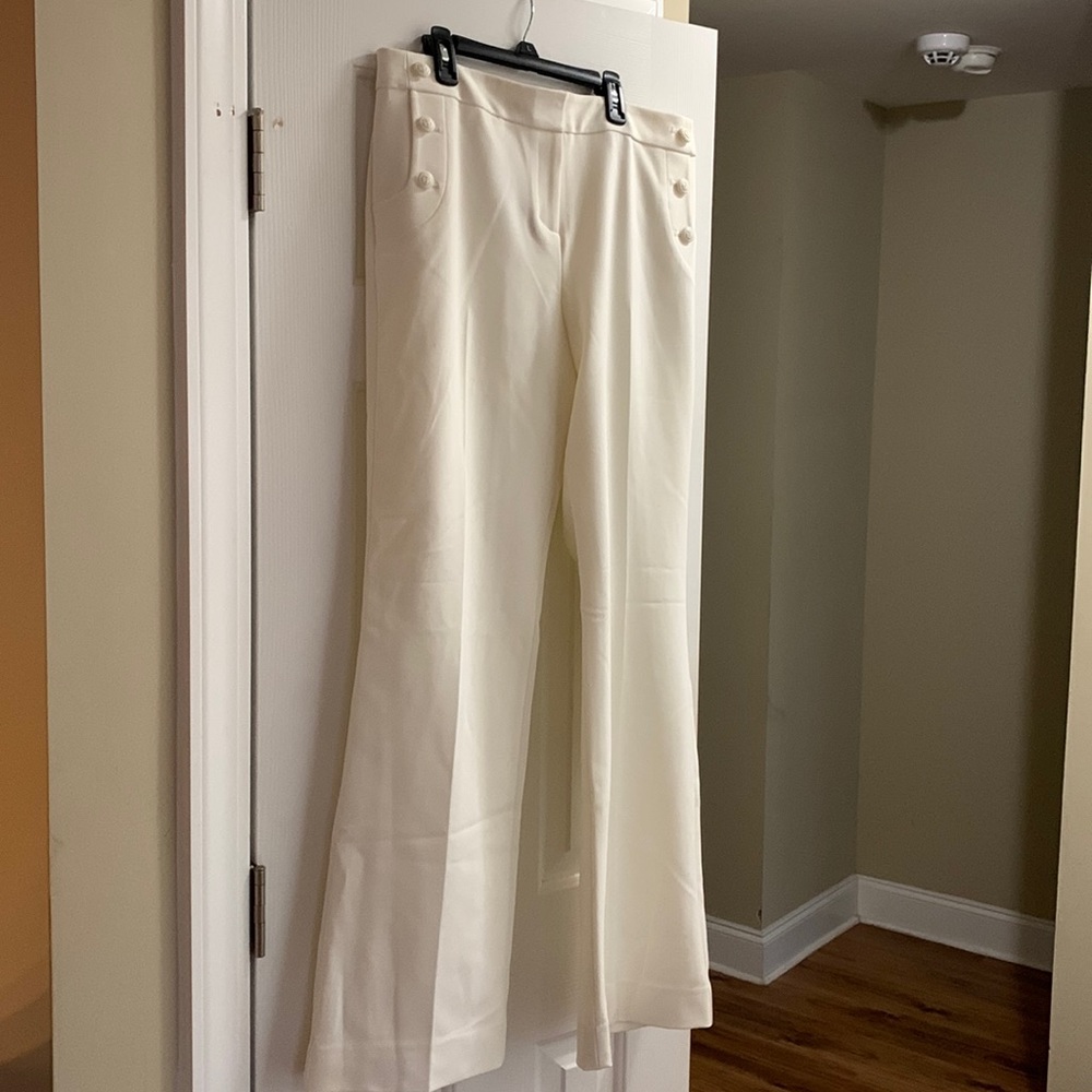 The Limited cream colored dress pants. High waisted. Classic flare. Size 10.